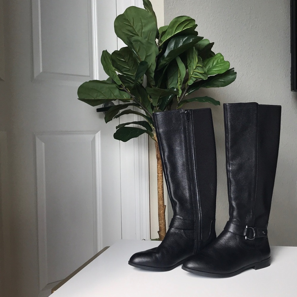 Black leather knee-height boots